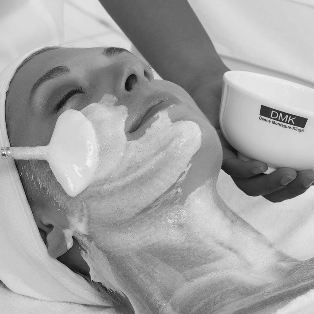 Black and white thumbnail image depicting DMK Enzyme Therapy for skin rejuvenation.