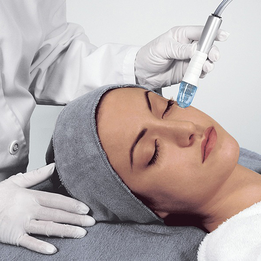 Woman receiving Pepita Microdermabrasion treatment at Janine’s Skin & Laser Clinic